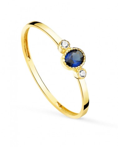 Sortija oro 18k piedra azul y circonitas 4x3mm
