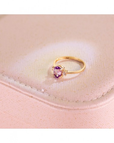 Sortija oro 18k piedra amatista y circonita laterales