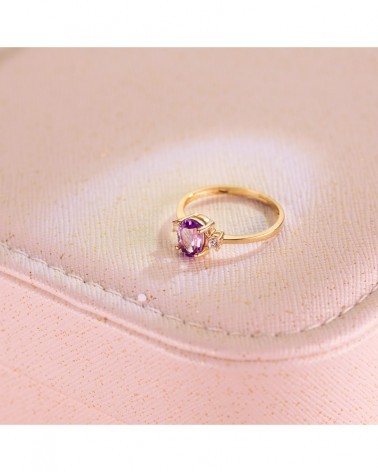 Sortija oro 18k piedra amatista y circonita laterales