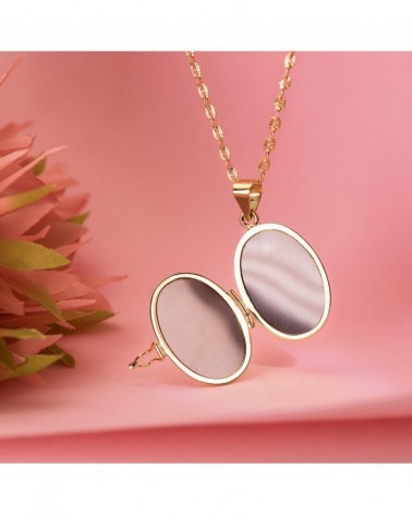 Guardapelo oro 18k oval labrado flores 26x21mm