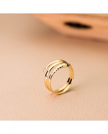 Anillo oro 18k serpiente dos vueltas ojos azules