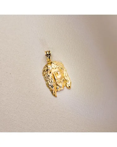 Colgante Cristo oro 18k rostro tallado 26x16mm
