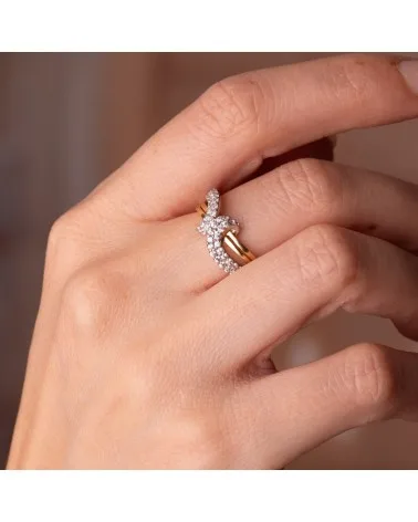 Sortija oro 18k bicolor calada con motivo cruzado