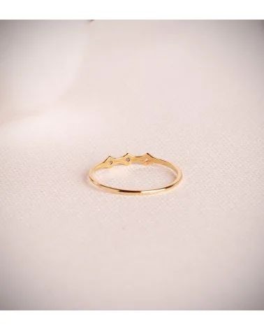 Sortija oro 18k amarillo bambú con 3 circonitas azules