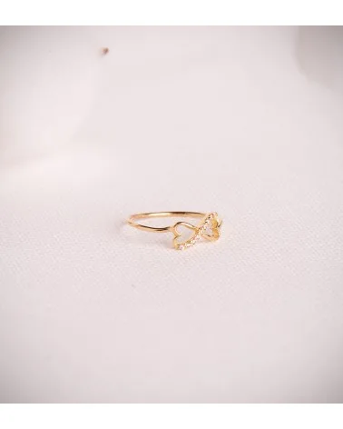 Sortija oro 18k amarillo corazones calados unidos