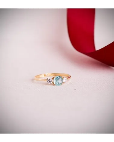 Sortija oro 18k amarillo aguamarina ice y circonitas en garras