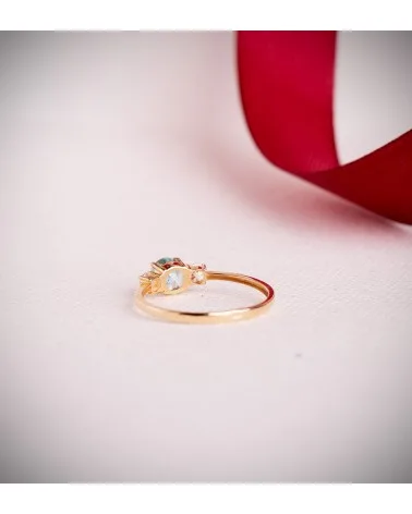 Sortija oro 18k amarillo aguamarina ice y circonitas en garras