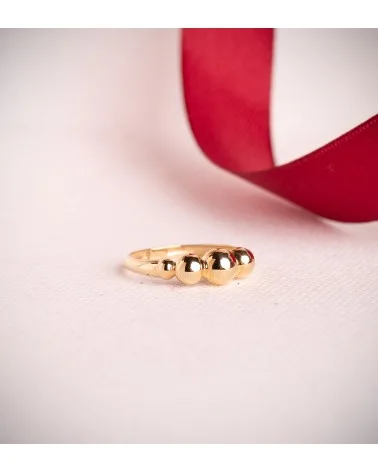 Sortija oro 18k amarillo con cinco bolas en disminucion 5,5 mm