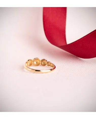 Sortija oro 18k amarillo con cinco bolas en disminucion 5,5 mm