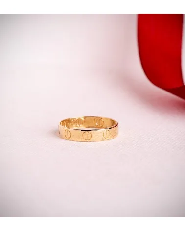 Sortija oro 18k amarillo lisa con tornillos brillo