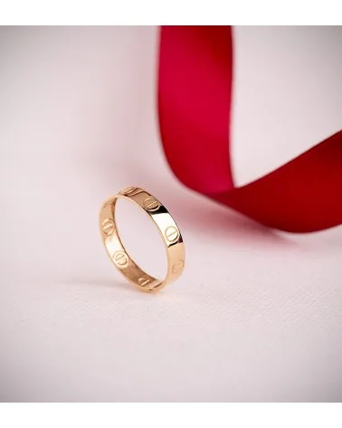 Sortija oro 18k amarillo lisa con tornillos brillo