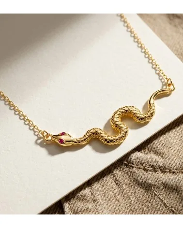 Colgante oro 18k amarillo serpiente ojos circonitas rojas