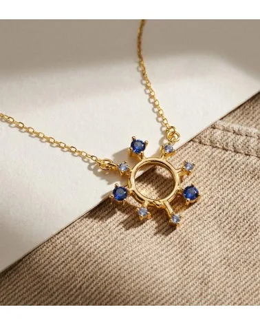 Colgante oro 18k amarillo rayos de sol y circonitas azules