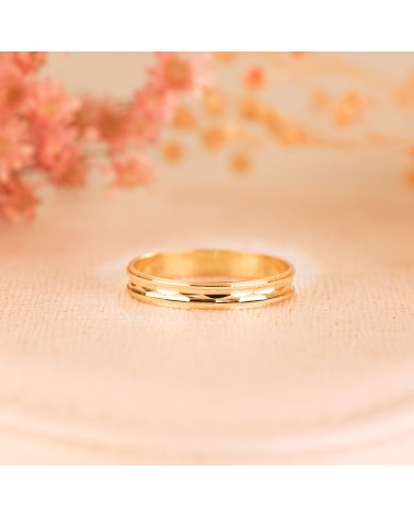 Alianza oro 18k amarillo tallada y bordes estriados ancho 3 mm